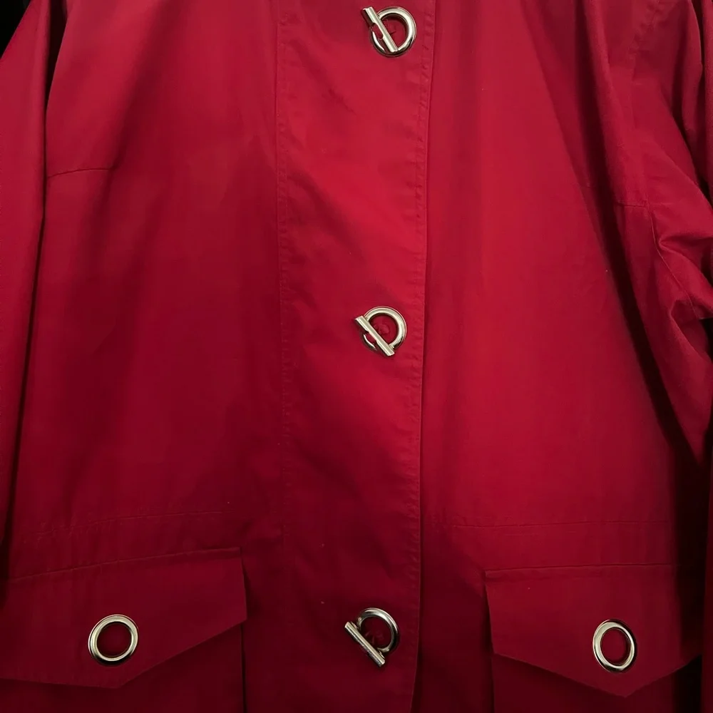Red coat/jacket.Silver coloured adornments. Water repellent. Lined. Nautical - Picture 7 of 12